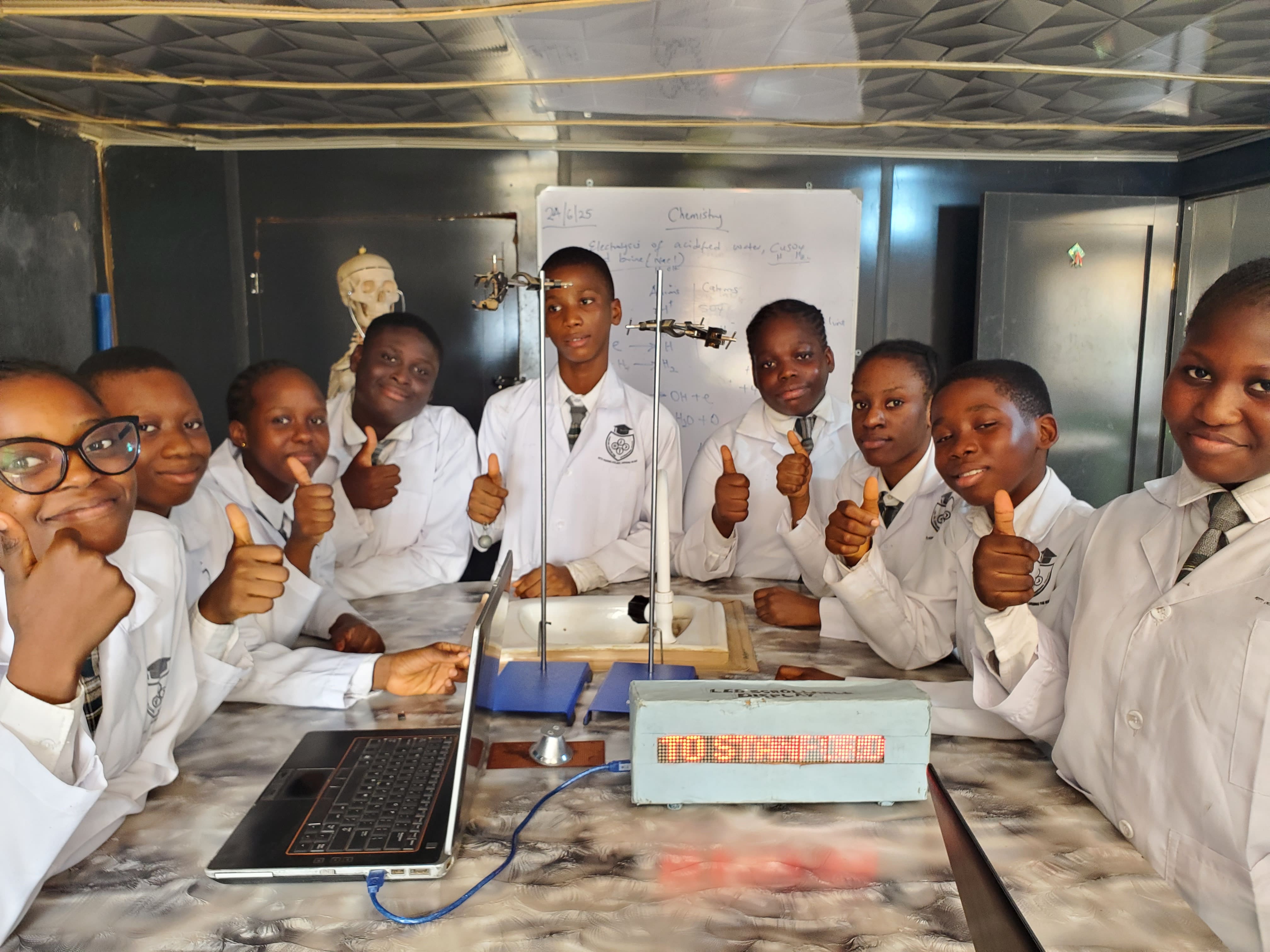 Students conducting experiments in the STEM science lab